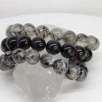 High-quality 13–14mm natural gemstone stretch bracelets featuring Blue Tiger's Eye, Tourmalinated Quartz, and Starry Night Moonstone beads.