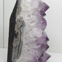 Amethyst cut base cluster with natural banding and raw edge, display piece from Star Woman Crystals Scottsdale AZ