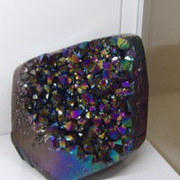 Aura Quartz crystal on a white background