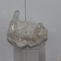 Natural Clear Quartz cluster with long terminated points and bright shimmer