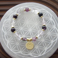Natural fluorite bracelet with 18k gold-plated lotus bead for mental clarity and grounding.