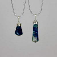 Natural Hauyne with Sodalite pendant from Badakhshan Afghanistan with 925 sterling silver bail and blue marbled pattern, UV reactive crystal jewelry.