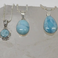 Natural Dominican Larimar sterling silver pendants with Caribbean blue and white patterning