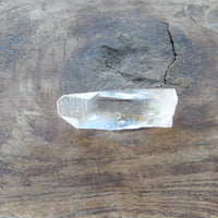 Natural quartz Lemurian crystal with surface texture