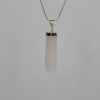 Natural Mangano Calcite pendant with 925 sterling silver bail, polished crystal point necklace, UV reactive fluorescent pink crystal.
