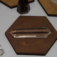 Double-terminated high-clarity phantom quartz points displayed for Star Woman Crystals.