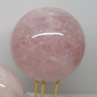 Large rose quartz sphere with gorgeous pink tones, emotional healing stone.
