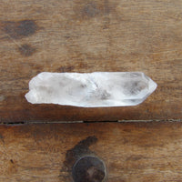 Crystal on a wooden surface
