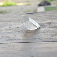 Clear quartz point with natural facets Series 4 - standing