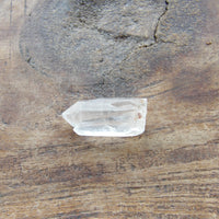 Clear quartz point Sedona charged crystal detail - twin formation with inclusion
