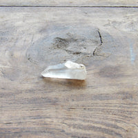 Clear quartz crystal point natural raw stone