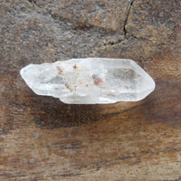 Clear quartz crystal point natural earth grown- natural inclusion