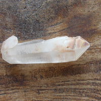 Clear quartz crystal point natural raw stone