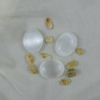 Selenite Palm Stones (small) $5 (Price Per Piece)