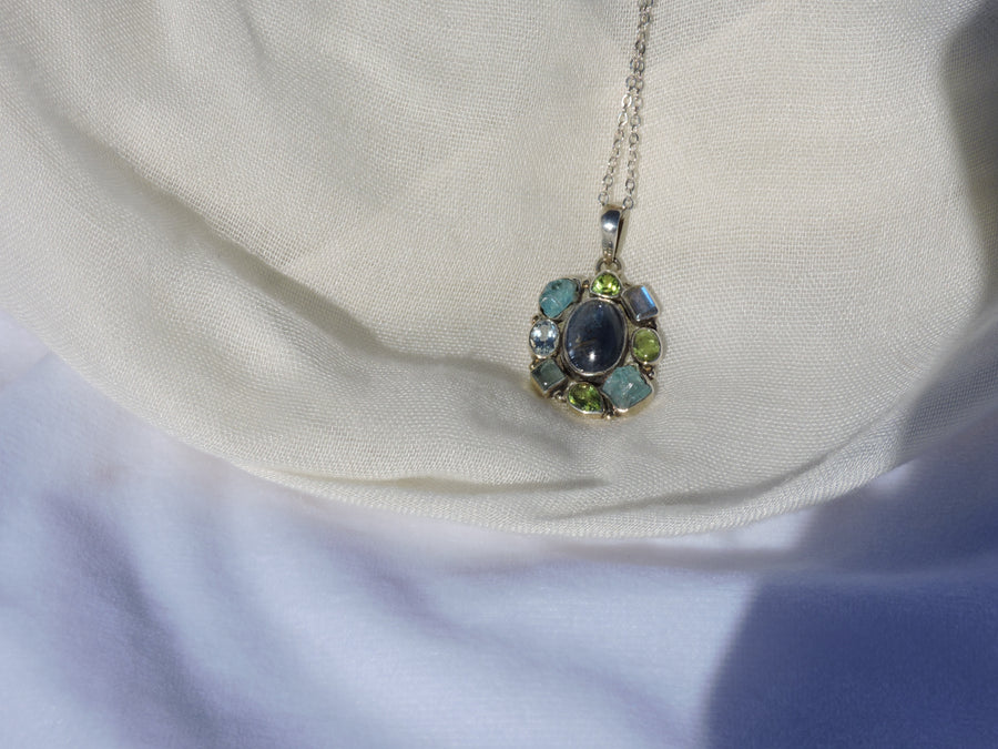 Multi-Gemstone Pendant – A Symphony of Serenity and Elegance