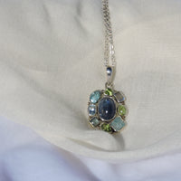 Multi-Gemstone Pendant – A Symphony of Serenity and Elegance