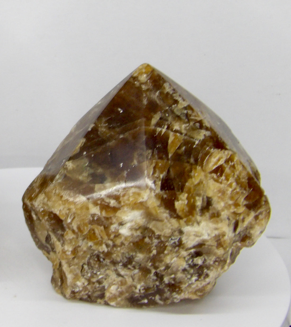Brazilian Chocolate Calcite polished freestanding crystal point 494 grams