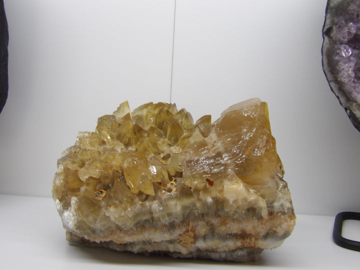 Large golden Calcite Dogtooth Cluster crystal, 6 lbs, 8x6x4 inches, with sharp honey-colored terminations on display.