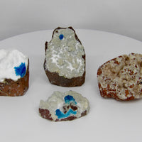 Rare Cavansite specimen from India featuring vivid electric-blue crystal rosettes on natural matrix available as a choose your piece listing from Star Woman Crystals.