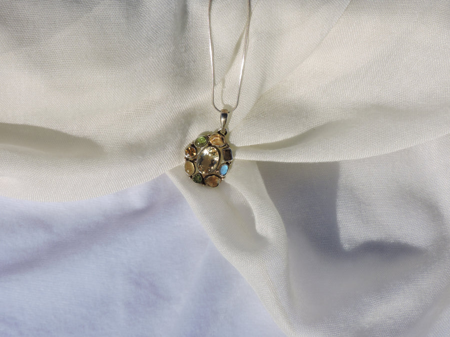 Multi-Gemstone Pendant – A Harmony of Nature's Radiance