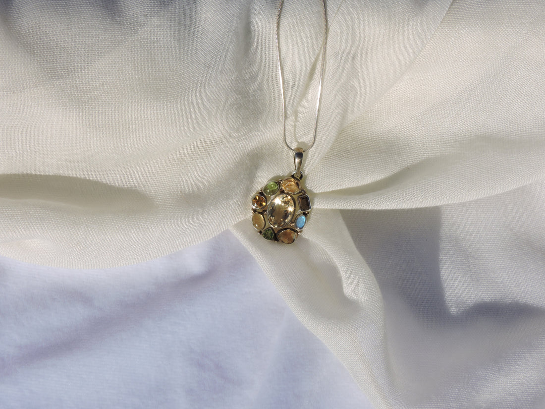 Multi-Gemstone Pendant – A Harmony of Nature&