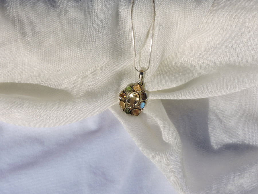 Multi-Gemstone Pendant – A Harmony of Nature's Radiance