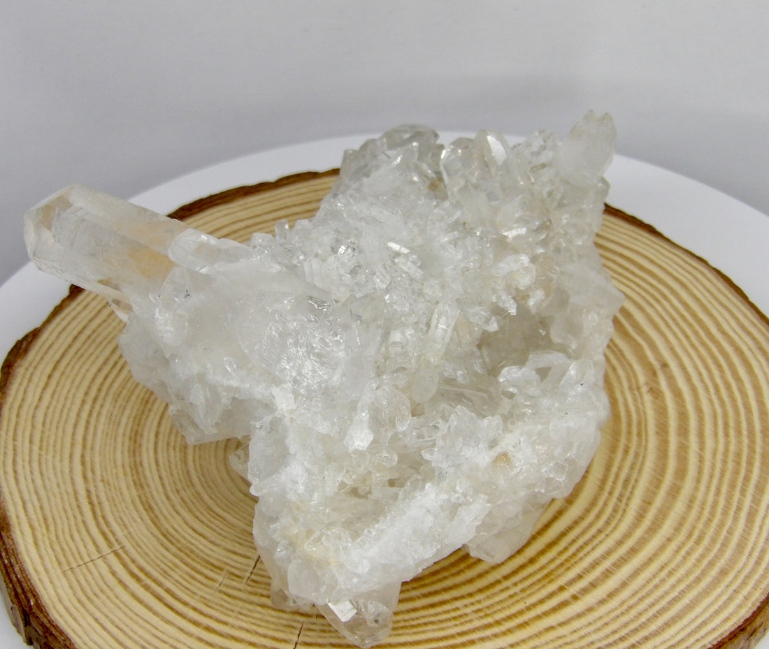 Natural Clear Quartz cluster with long crystal point and cave-like crystal pocket