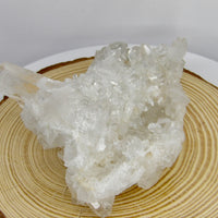 Natural Clear Quartz cluster with long crystal point and cave-like crystal pocket