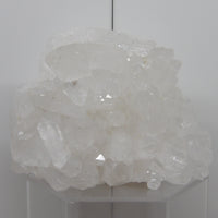 Large Clear Quartz cluster with reflective faces and layered formations