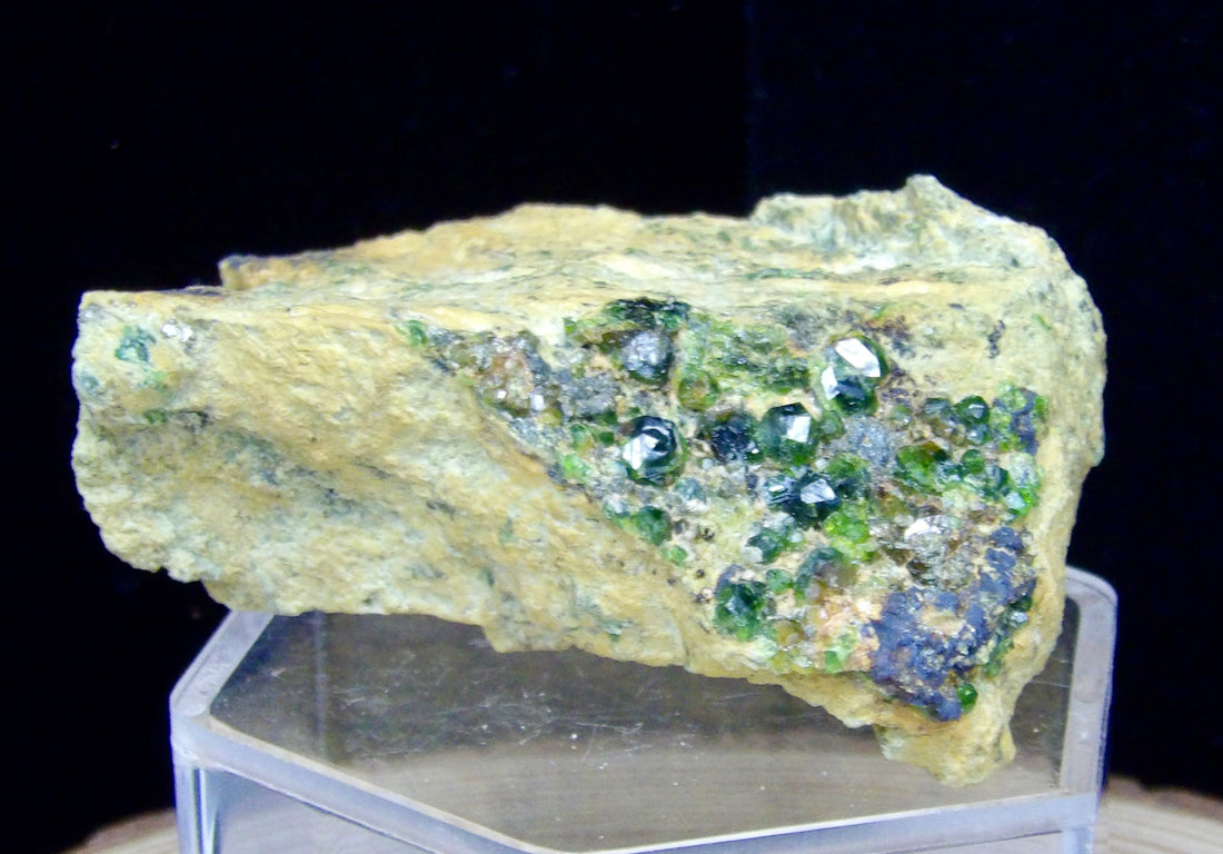 Natural 100g Demantoid Green Garnet specimen from Balochistan Pakistan featuring small brilliant green garnet crystals on earthy natural matrix.
