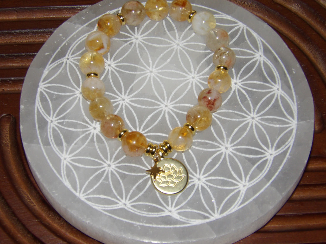 Handmade citrine abundance manifestation bracelet with gold star and lotus charms