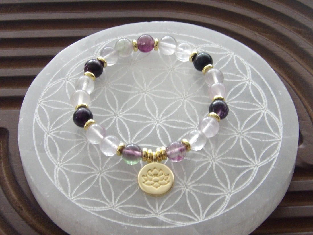 Handmade fluorite Divine Focus bracelet with 18k gold-plated lotus bead and gold spacers from Star Woman Crystals.