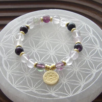 Handmade fluorite Divine Focus bracelet with 18k gold-plated lotus bead and gold spacers from Star Woman Crystals.
