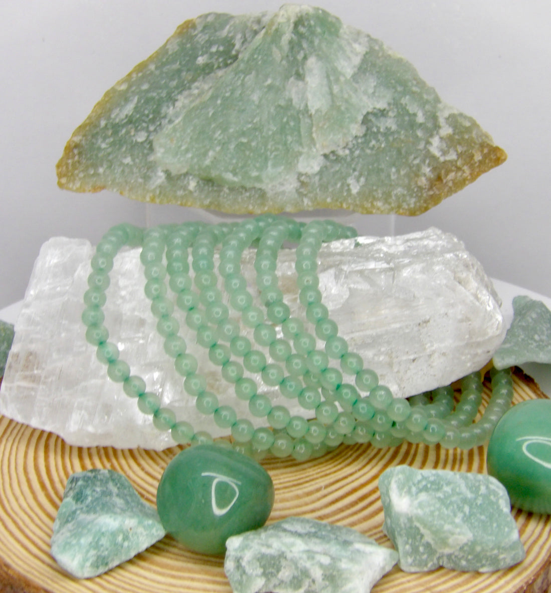 Natural 5 mm Green Aventurine stretch bracelet with polished green gemstone beads.