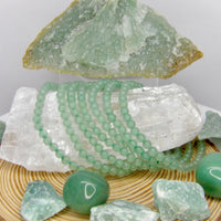 Natural 5 mm Green Aventurine stretch bracelet with polished green gemstone beads.
