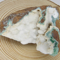 Natural Hemimorphite specimen from Tenke-Fungurume, Democratic Republic of the Congo featuring soft blue crystal formations on natural white matrix.