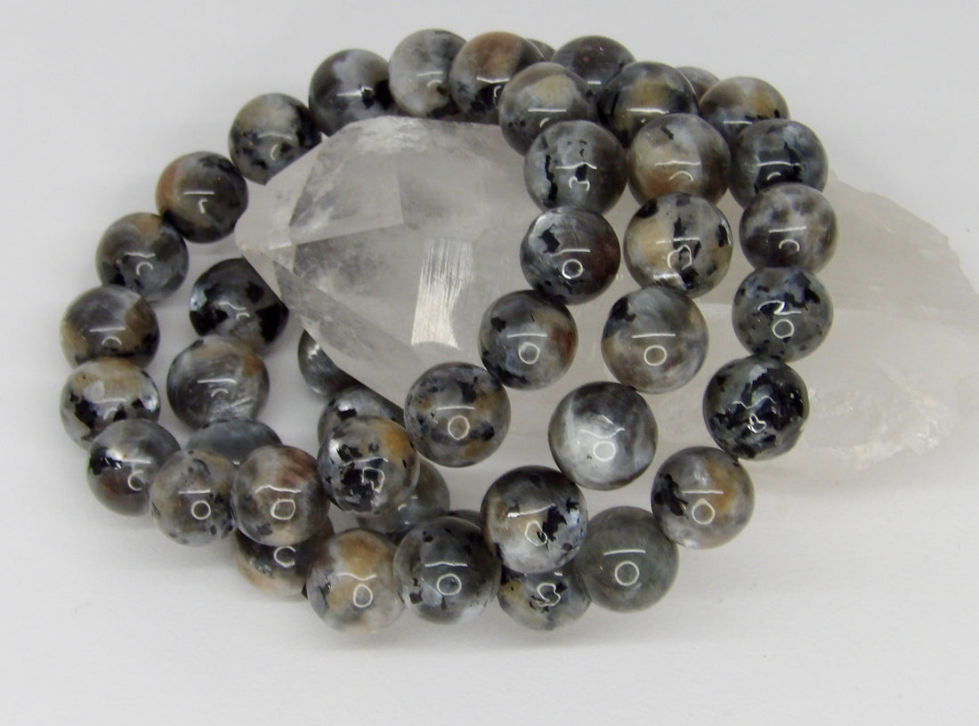 High-quality Starry Night Moonstone bracelet with natural 13–14mm gemstone beads featuring silver, charcoal, and earthy gray tones.
