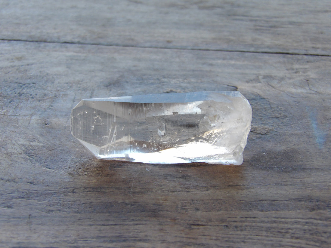 Lemurian quartz crystal showing horizontal striations