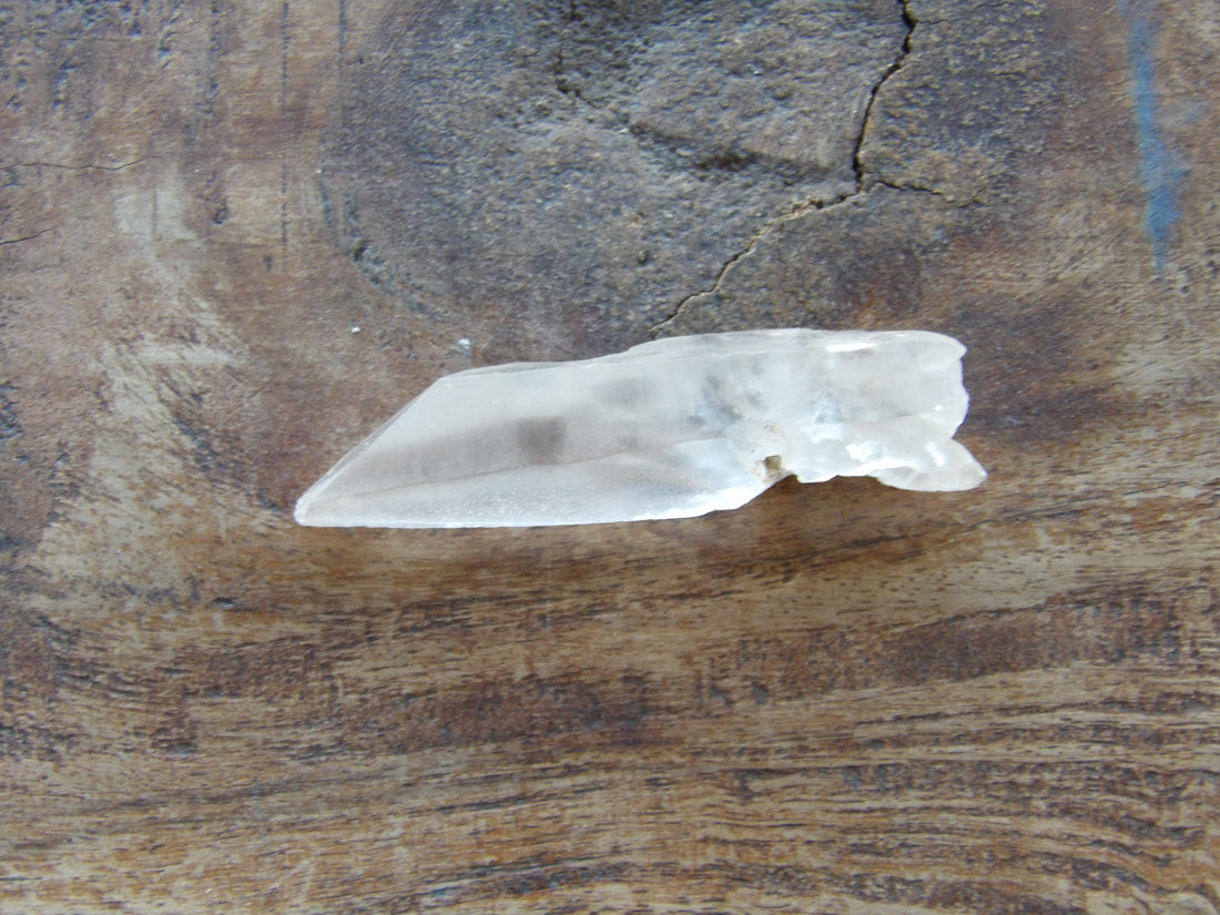 Natural quartz Lemurian crystal with surface texture