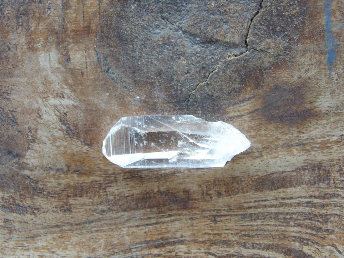 Close view of double terminated Lemurian quartz striated surface
