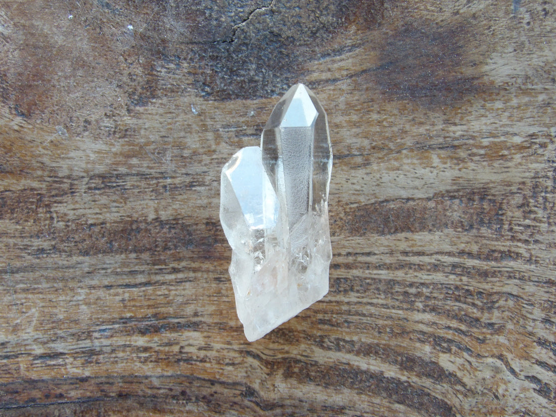 Clear raw Lemurian quartz crystal with unique formation