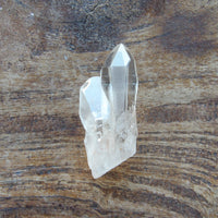 Clear raw Lemurian quartz crystal with unique formation