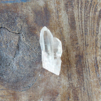 Raw Lemurian quartz crystal with twin formation