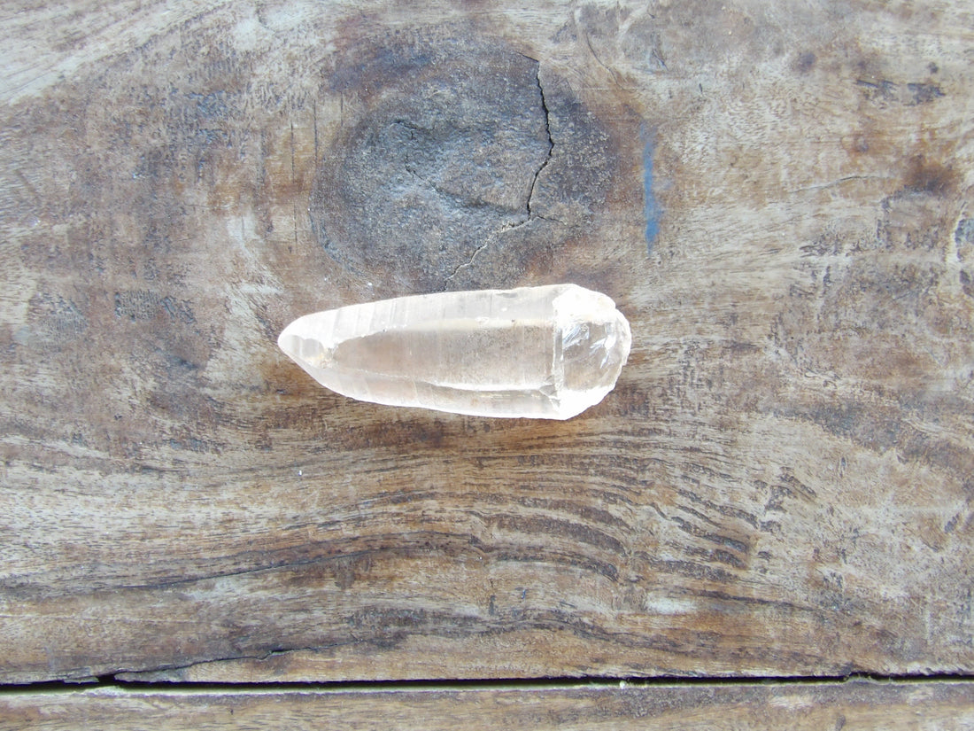 Natural Lemurian quartz point photographed by an Arizona crystal shop