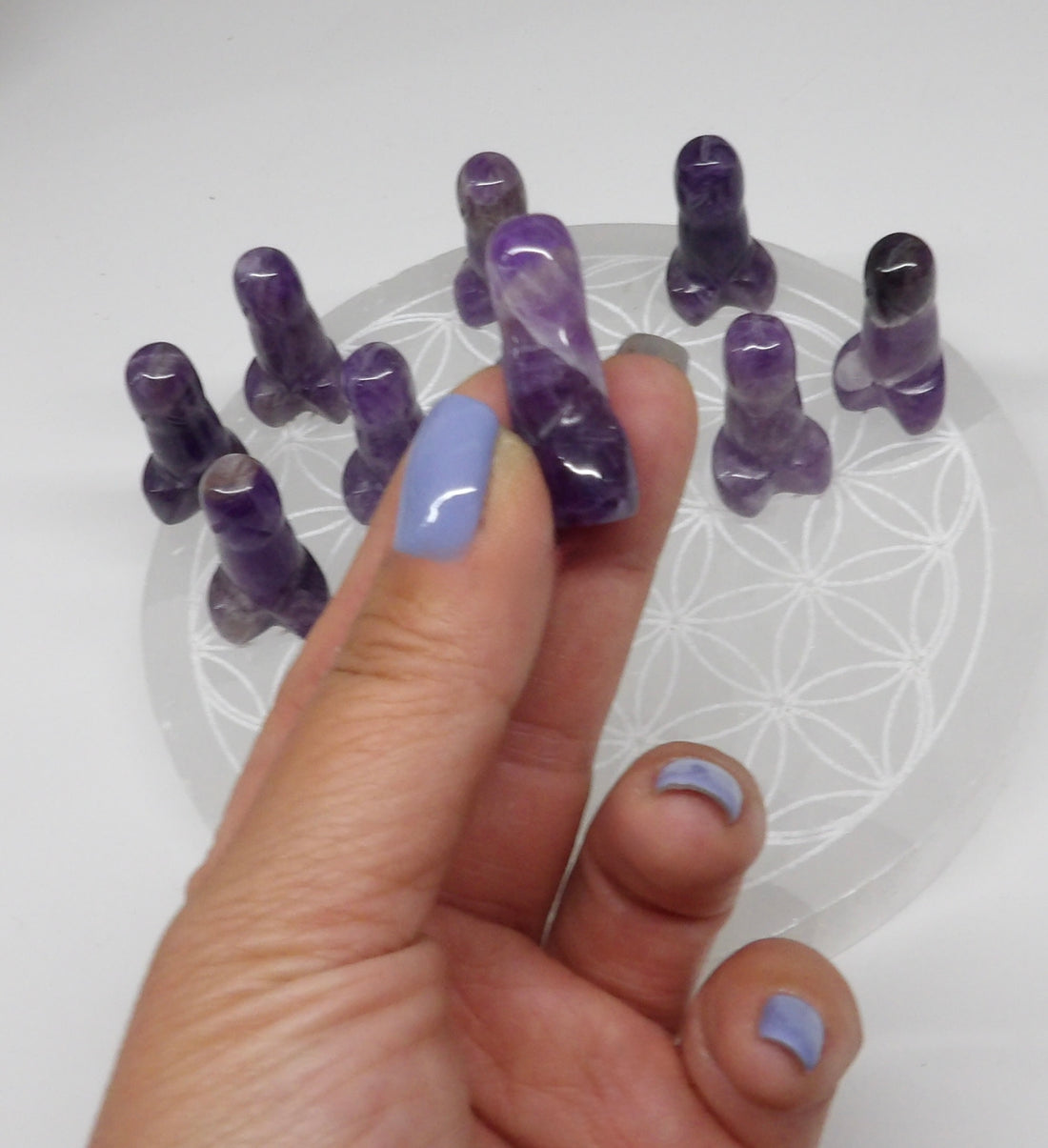 Amethyst Carving in hand to show size