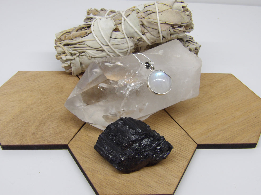 Quartz point with rainbows, black tourmaline and moonstone necklace