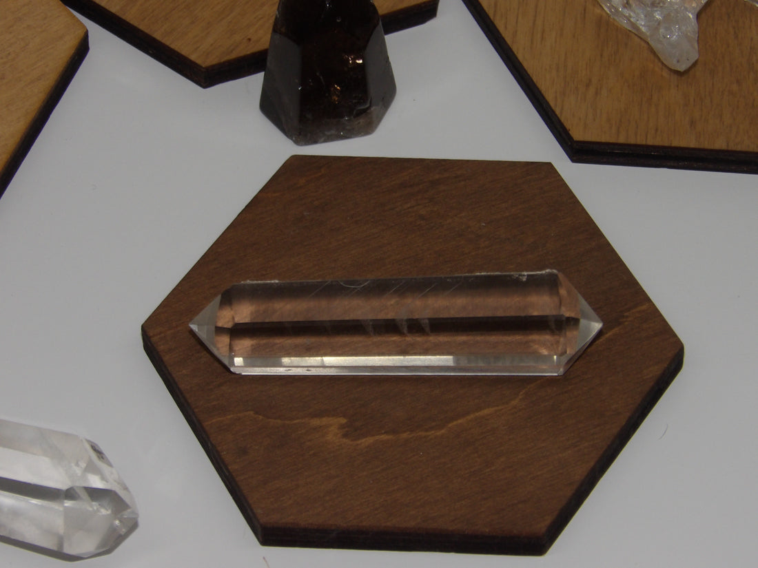 Double-terminated high-clarity phantom quartz points displayed for Star Woman Crystals.
