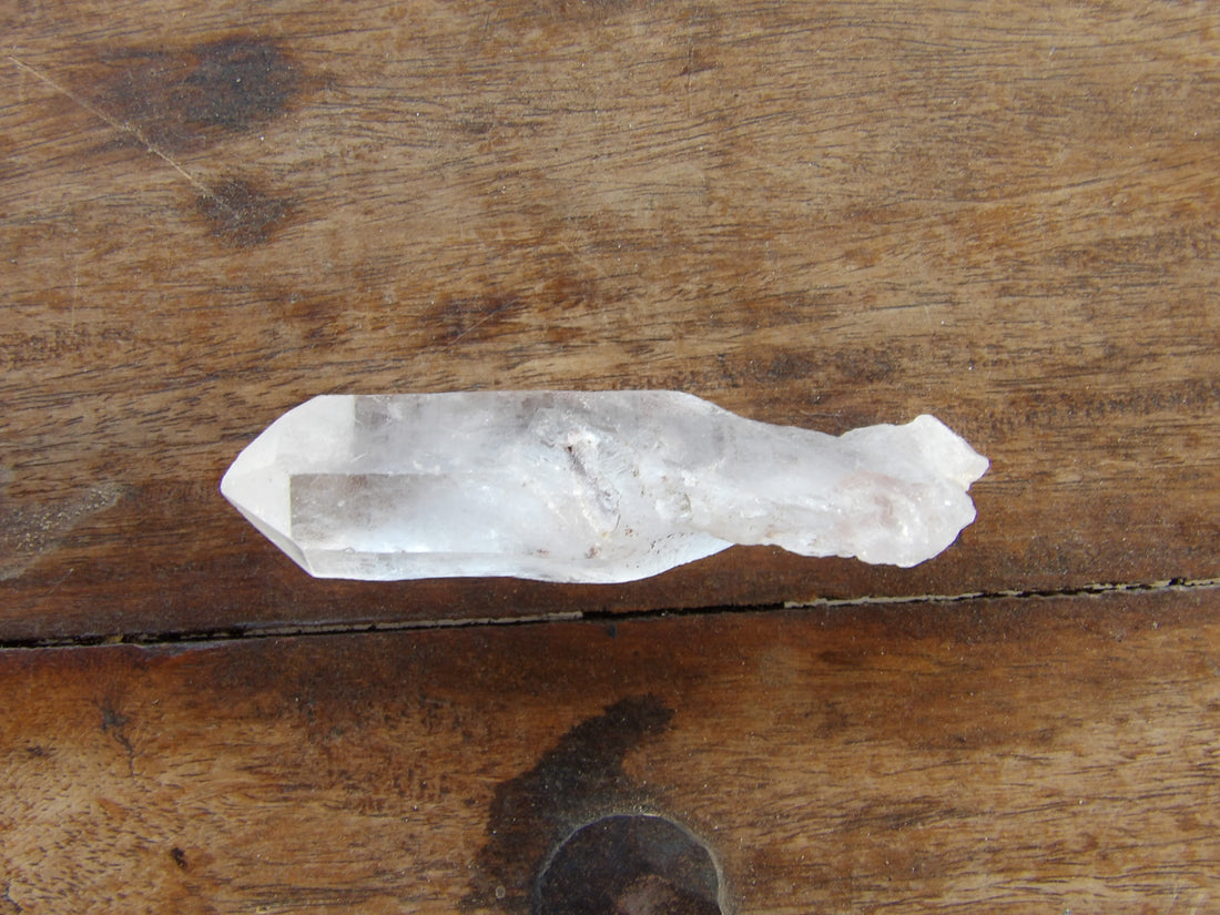 Self Healing clear quartz on wooden surface