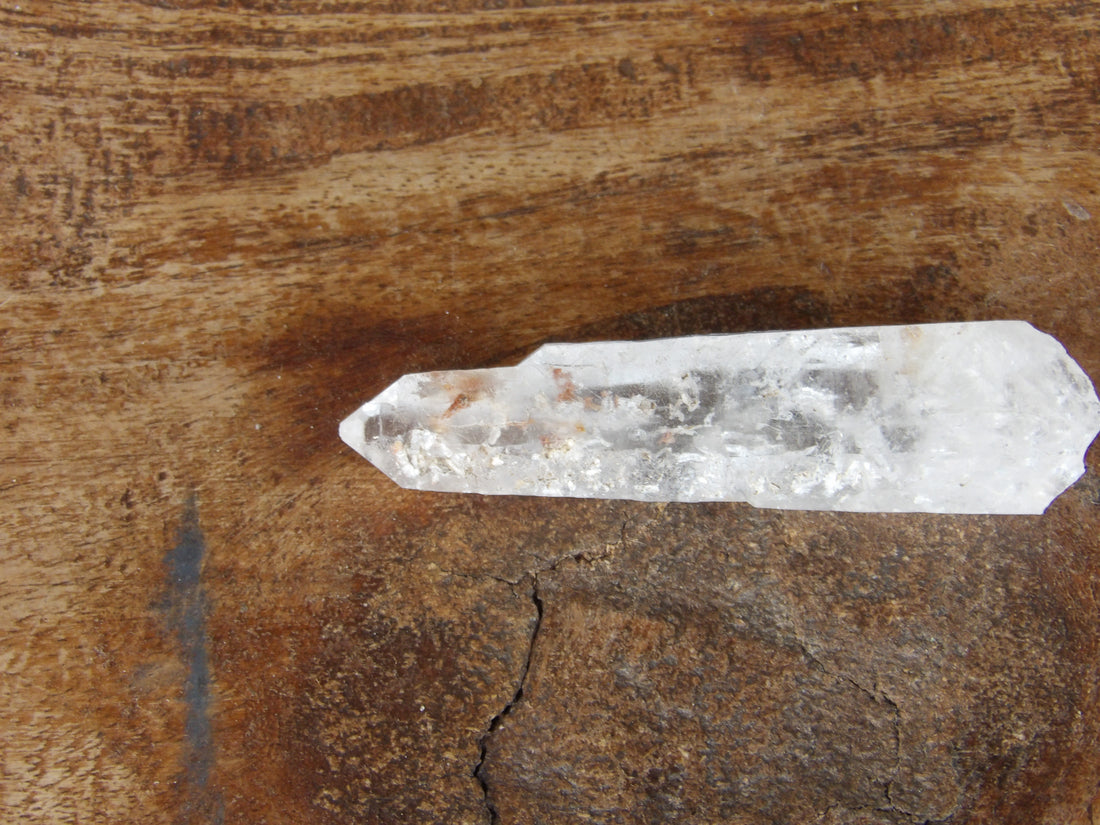Included clear quartz point