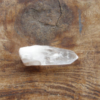 clear quartz point with milky bottom